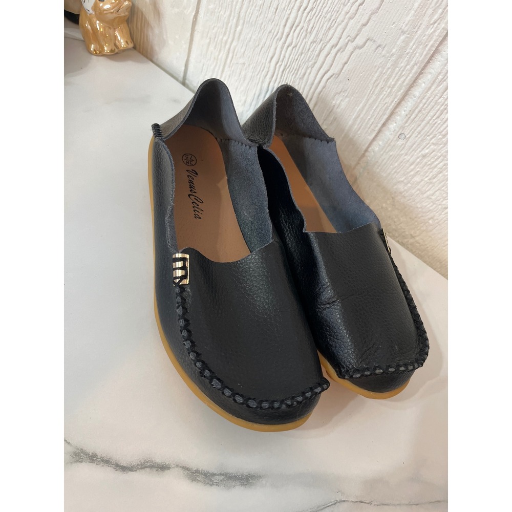 Venus Celia‎ black leather moc toe loafers.